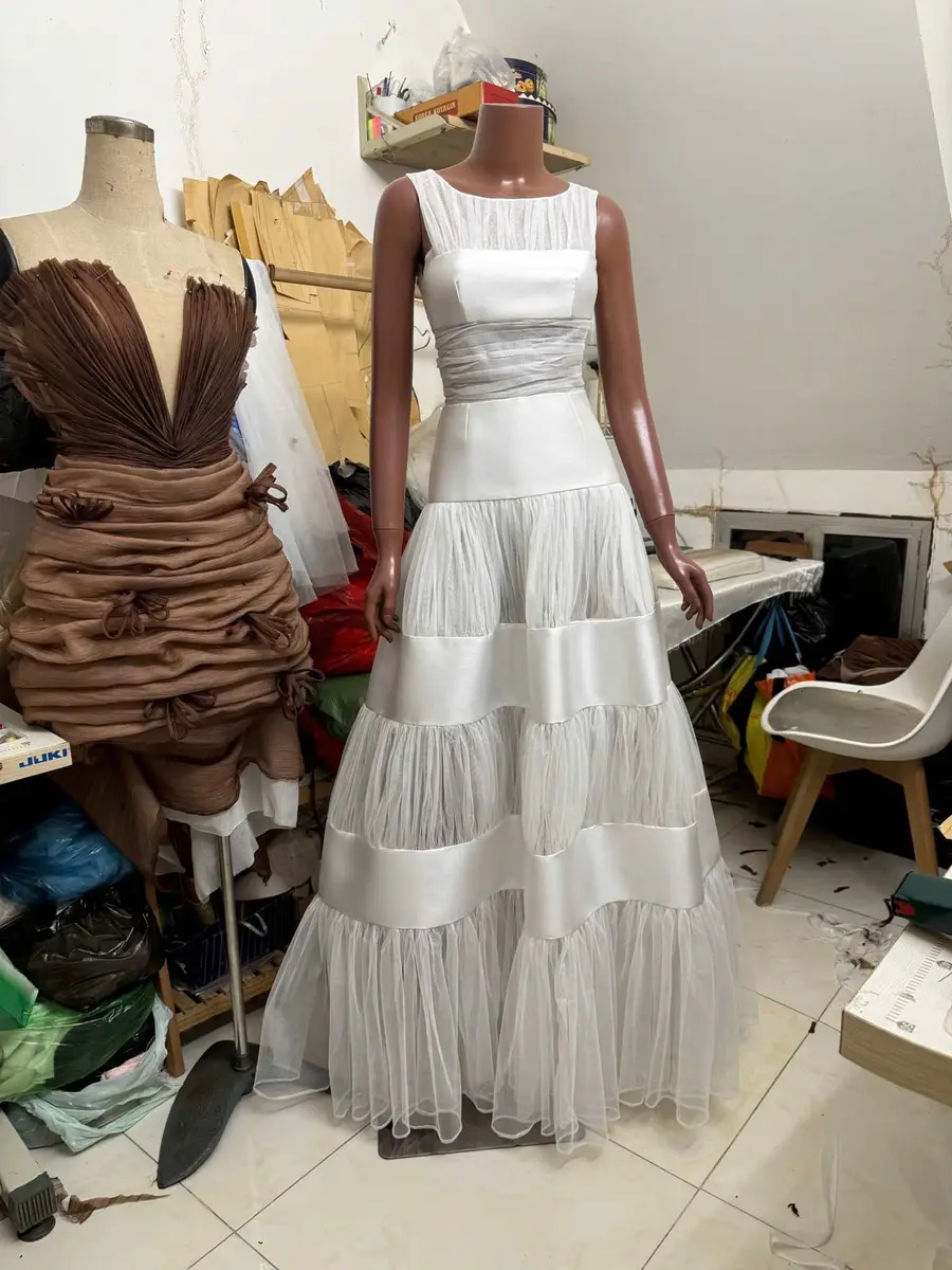Finished Mikado silk and tulle wedding dress made by VI Dressmakers before USA shipping