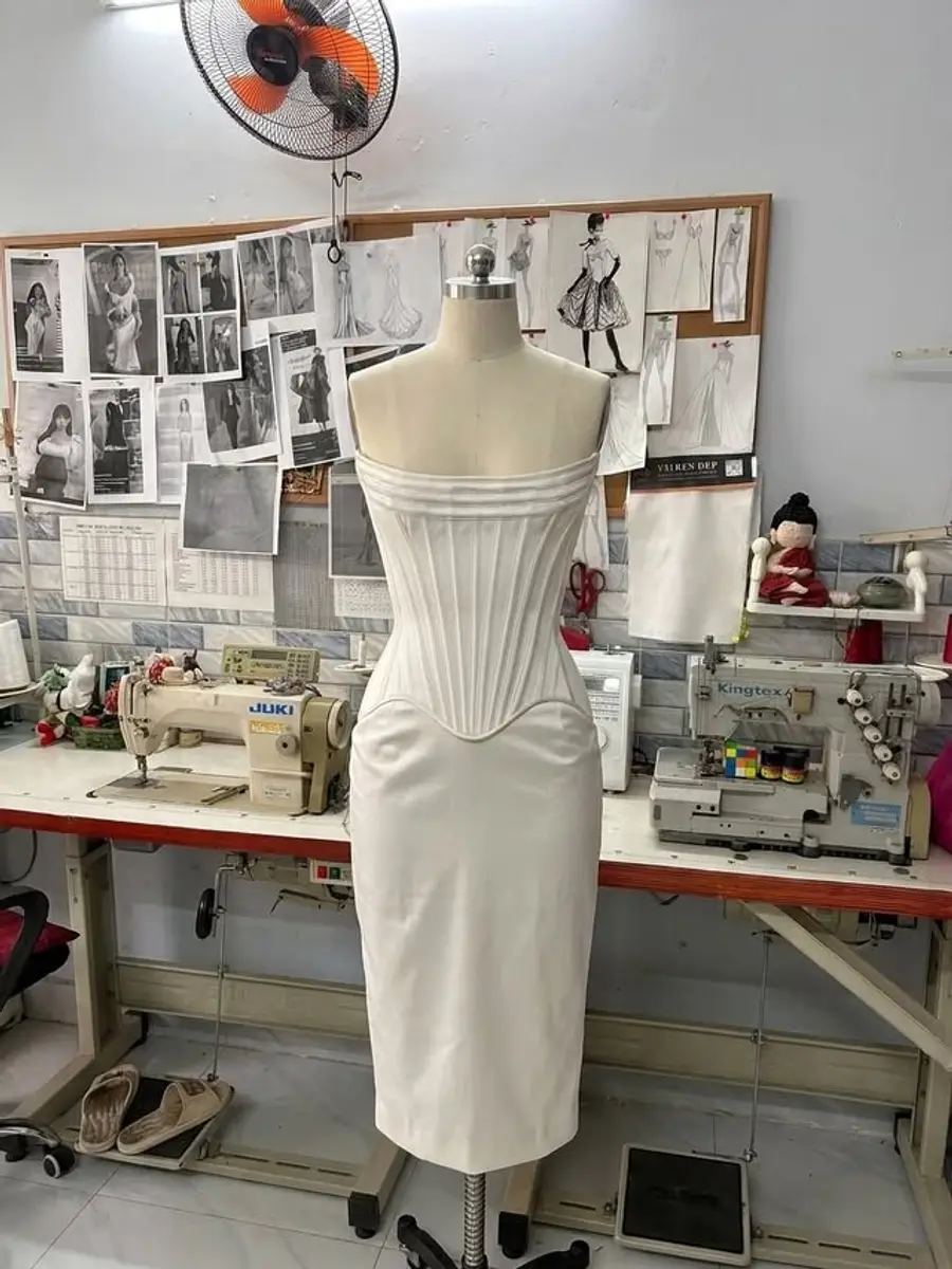 VI Dressmakers atelier workspace in Ho Chi Minh City used for custom wedding dress production planning