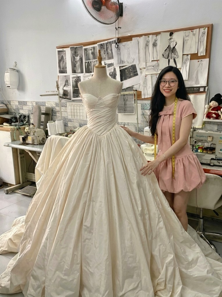 Vi, founder and lead designer at her Saigon atelier
